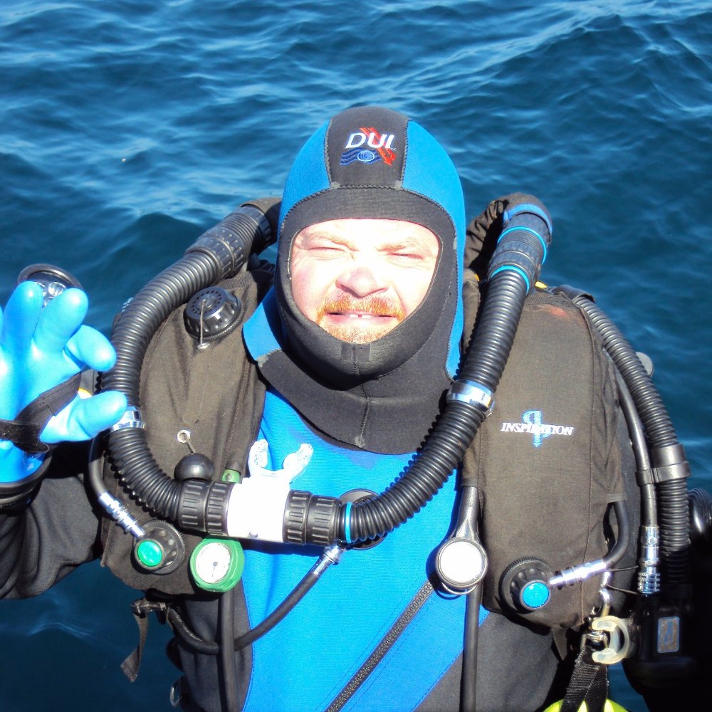 Darrell Seale, scuba instructor and technical diver, in rebreather gear at the surface