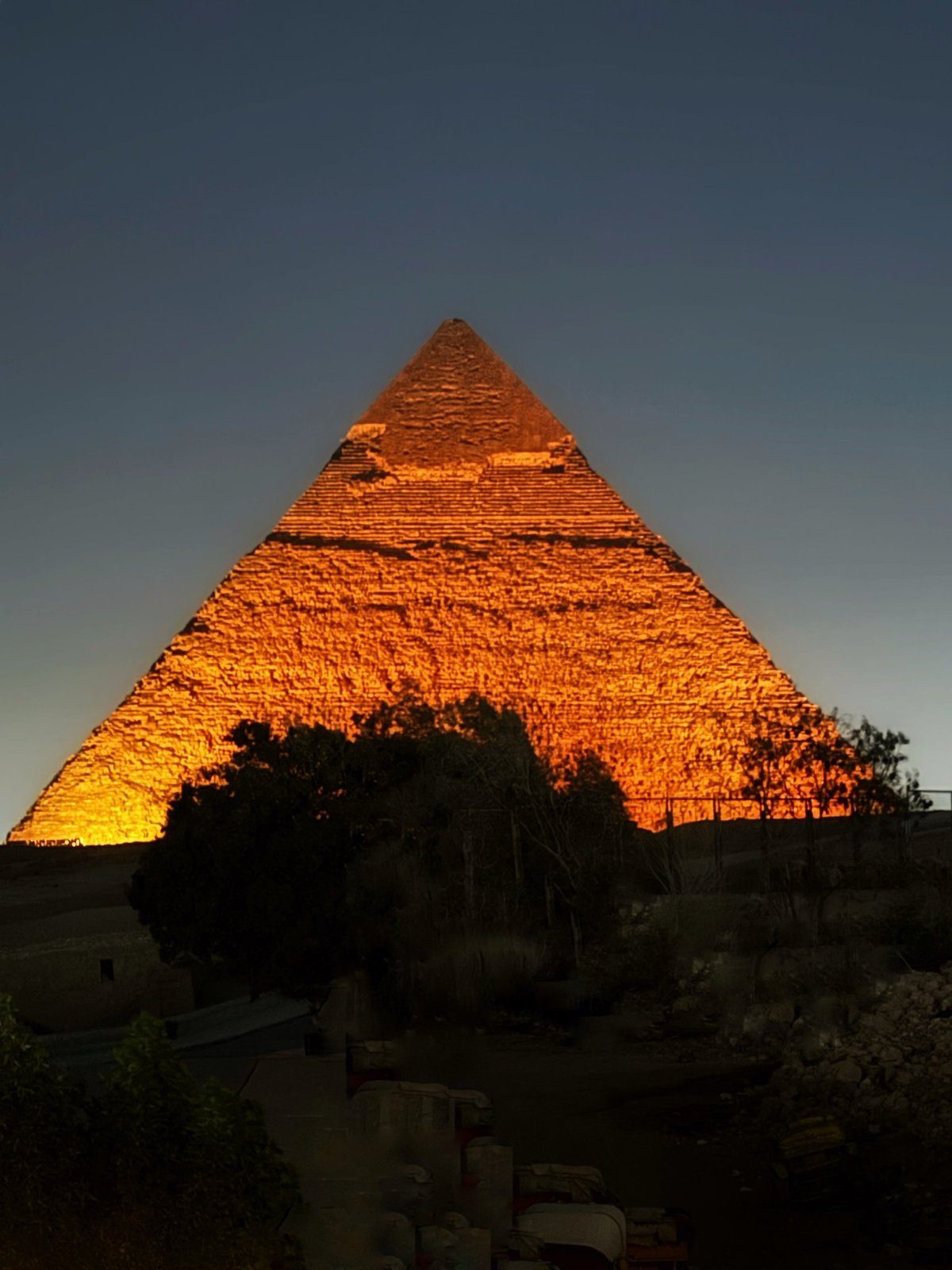 A pyramid at Giza lit up at night