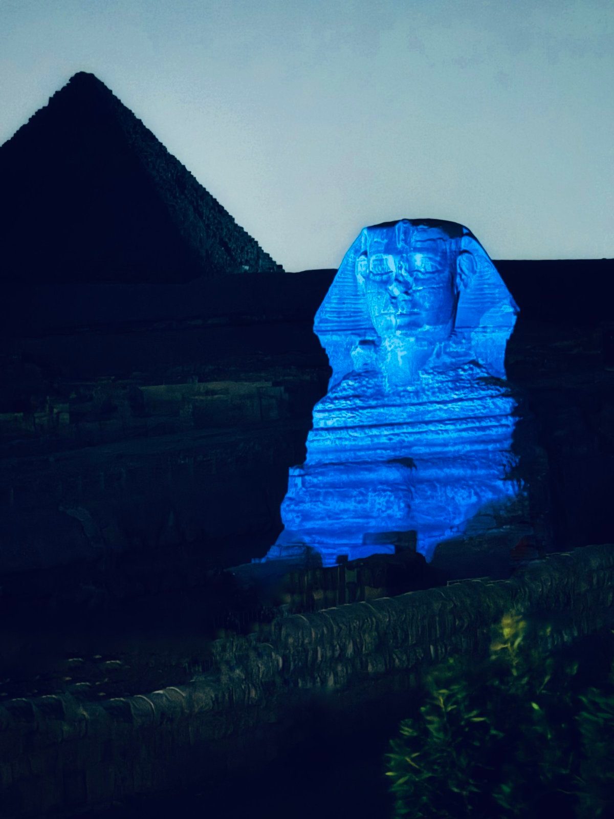 The Great Sphinx of Giza lit blue at night