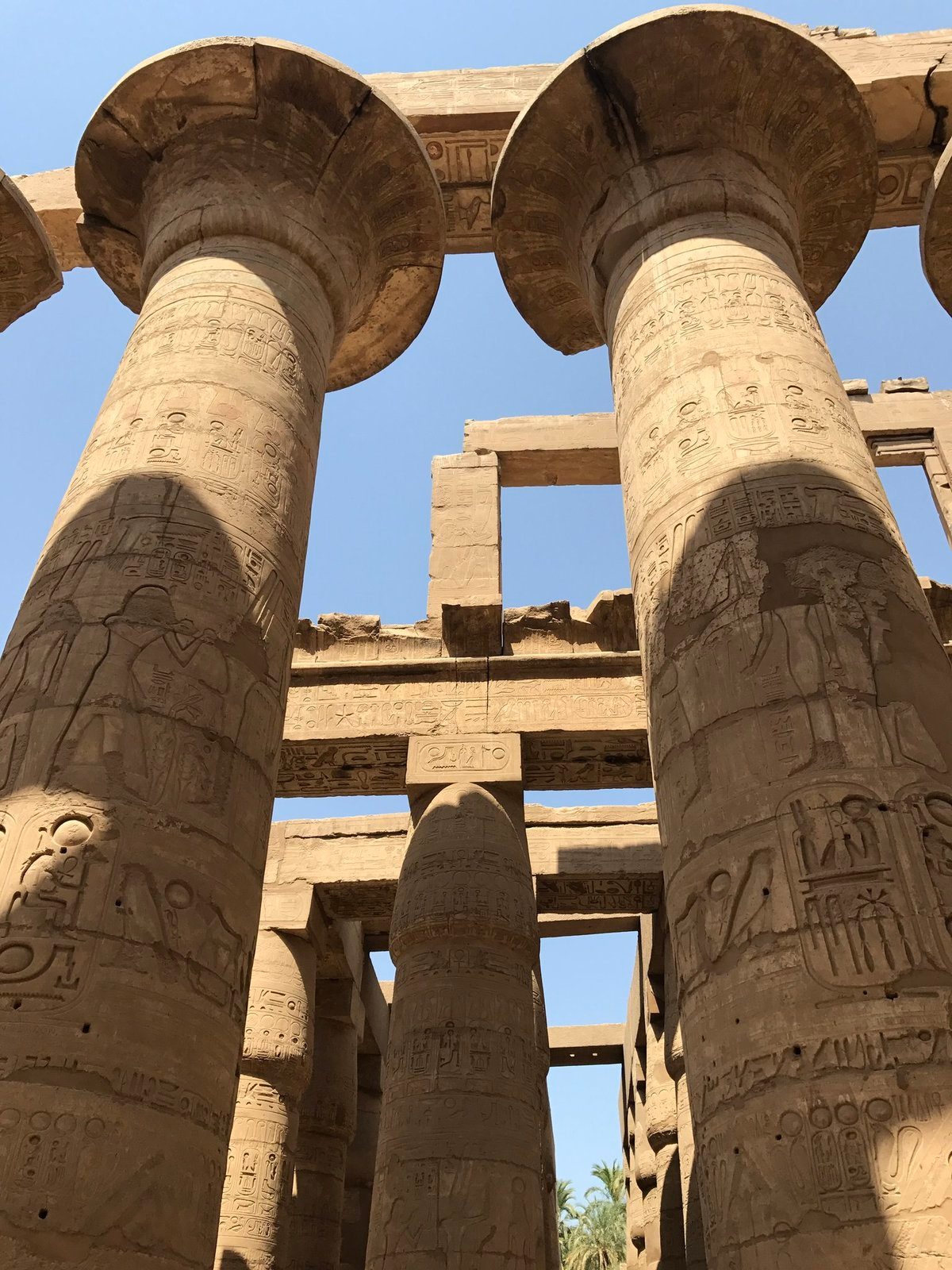 Massive carved columns of the hypostyle hall at Karnak, Luxor