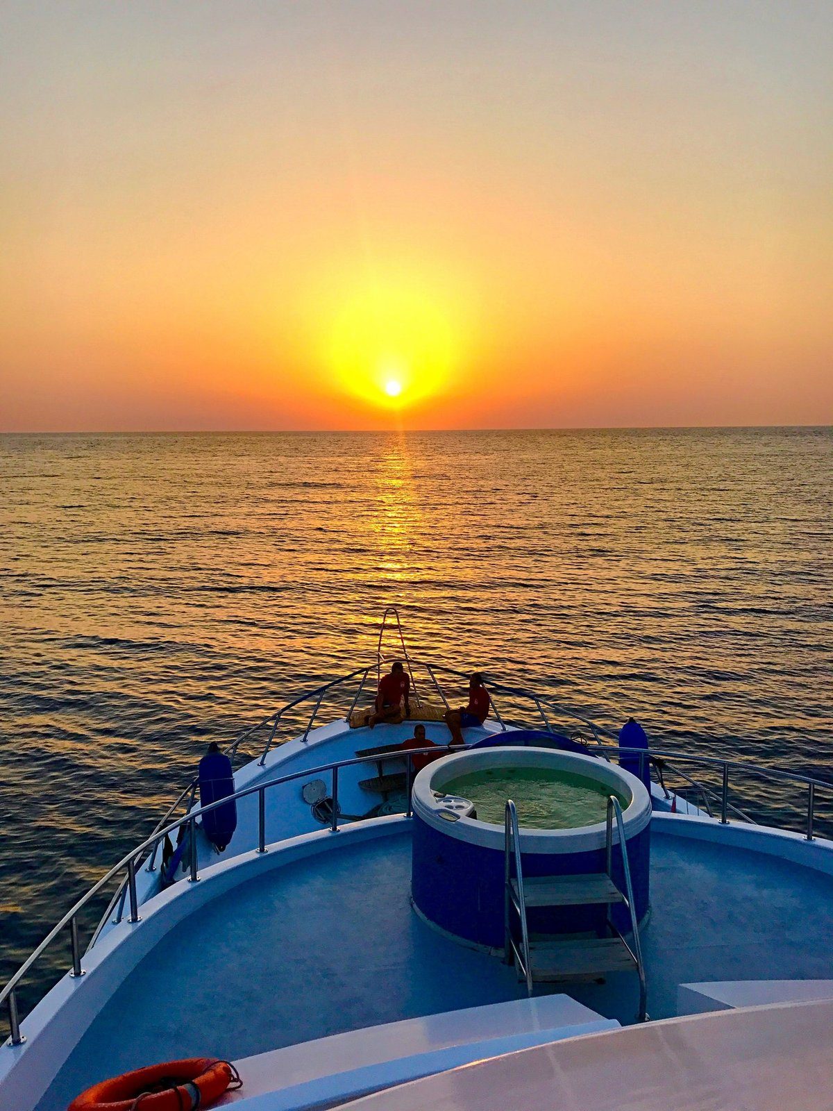 Sunset over the Red Sea seen from the bow of a liveaboard